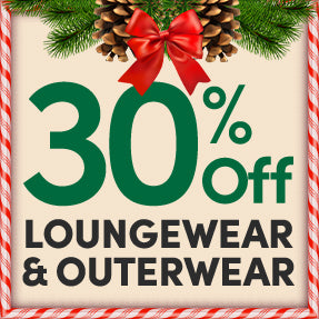 Promotional sign with 30% off loungewear and outerwear offer, surrounded by Christmas decorations.