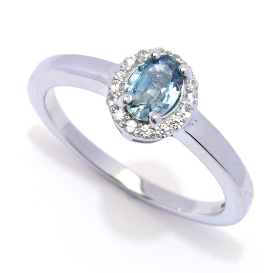 Gem Treasures 0.66ctw Oval Montana Sapphire & White Zircon Halo Ring