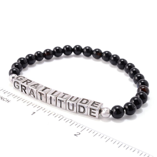 Platinum Plated Choice of Mantra Black Onyx Bead Stretch Bracelet