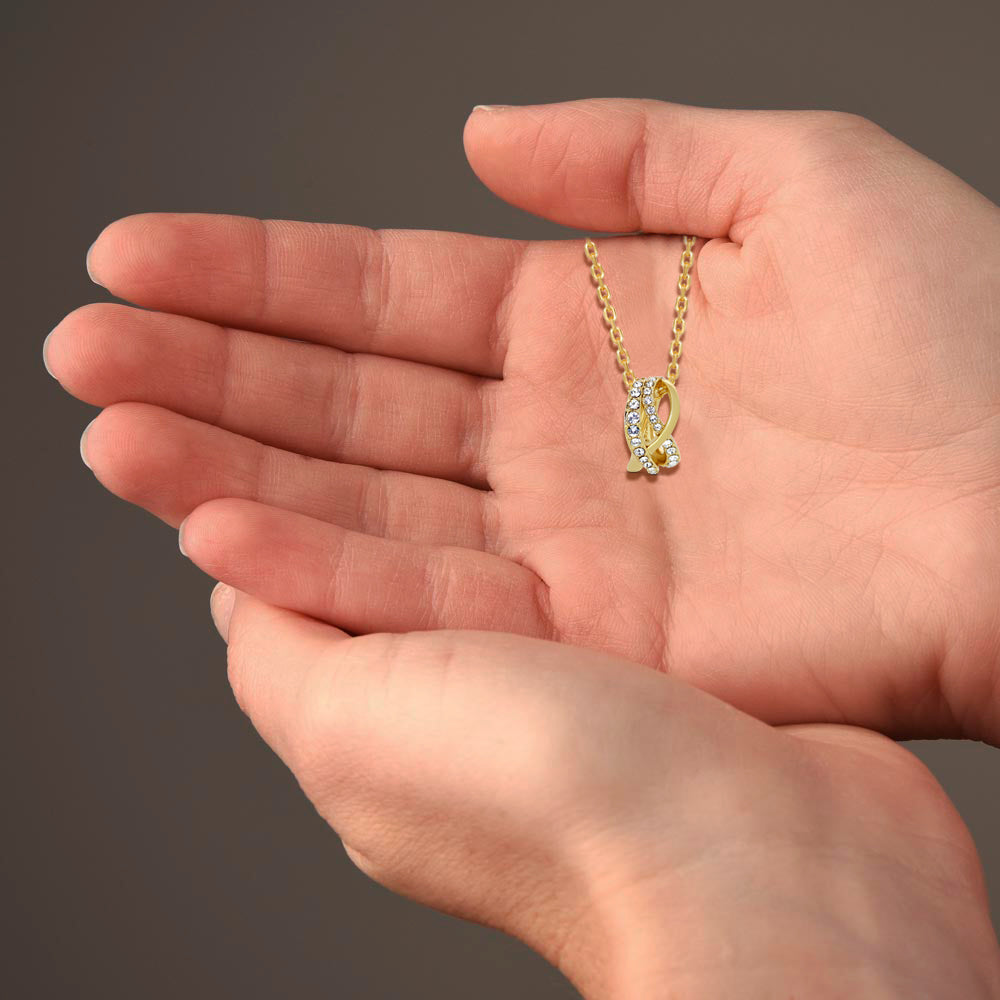 TRYNDI 18K Gold Plated "Eternal Knot" Swarovski Crystal Accented Necklace