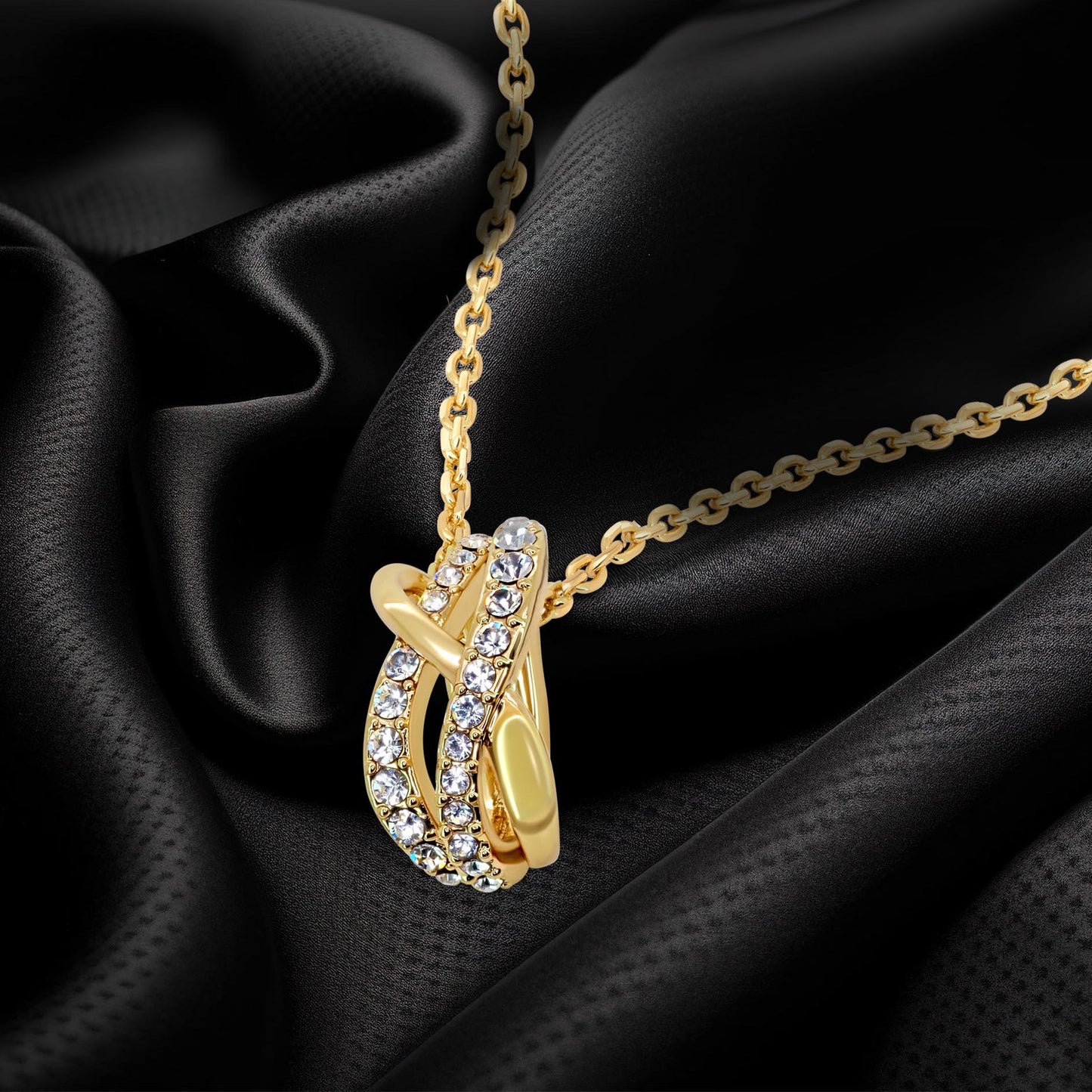 TRYNDI 18K Gold Plated "Eternal Knot" Swarovski Crystal Accented Necklace