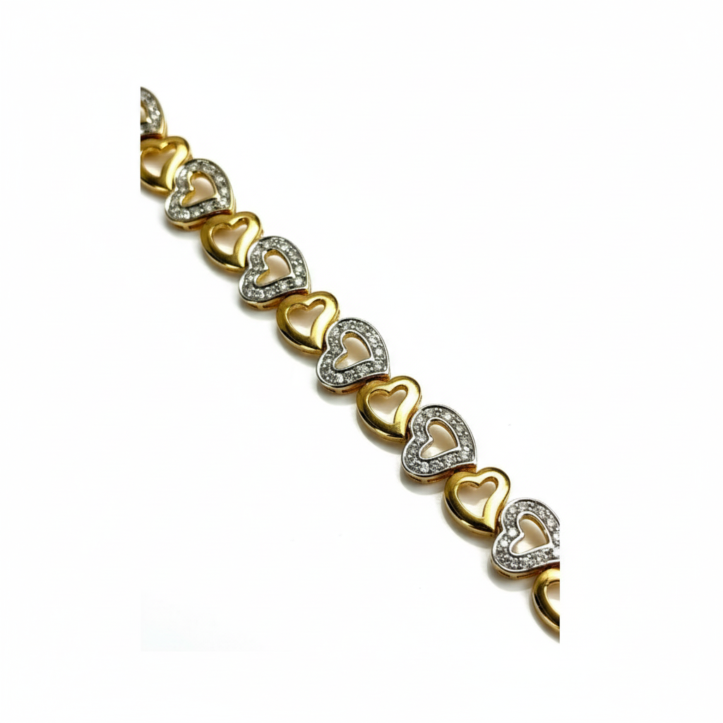 Gold bracelet with heart-shaped links on a white background