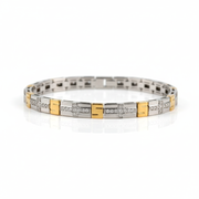 Two-tone bracelet with diamond accents on a white background