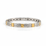 Two-tone bracelet with diamond accents on a white background