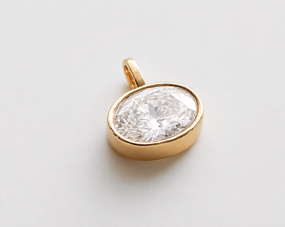 Brilliante Gold Plated Simulated Diamond 16x12mm Oval East-West Pendant