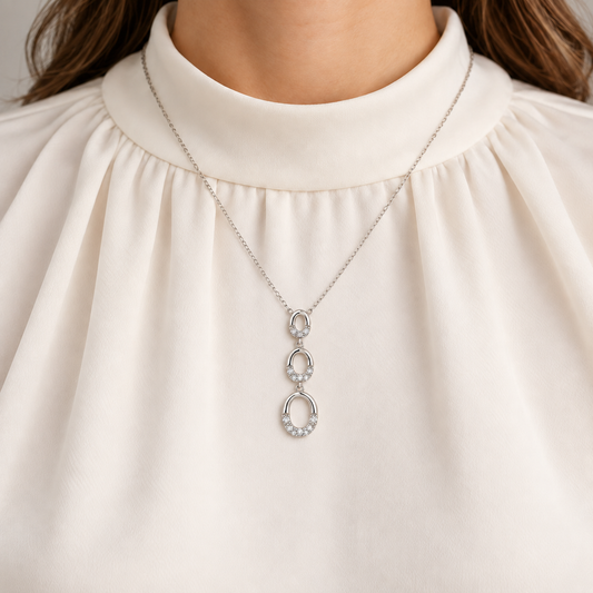 Sterling Silver 0.10ctw Diamond Graduated Oval Drop Pendant with Chain