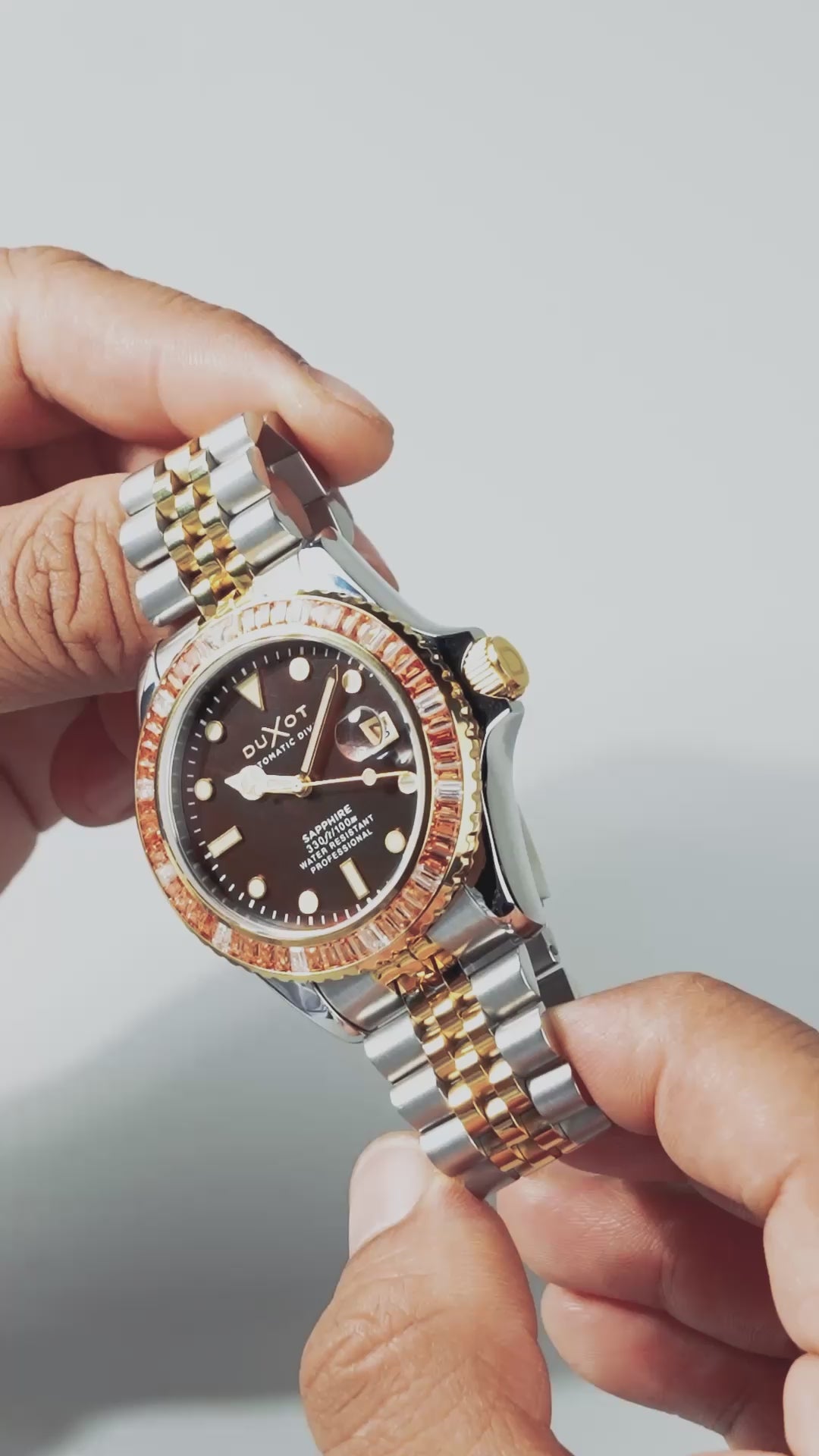Load video: Duxot Men's 40mm Atlantica 40 Rainbow Automatic MOP Dial Crystal Bracelet Watch
